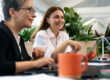 Employees using eco-friendly benefits in a California workplace