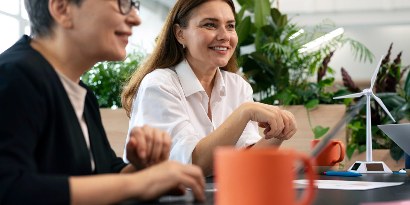 Employees using eco-friendly benefits in a California workplace