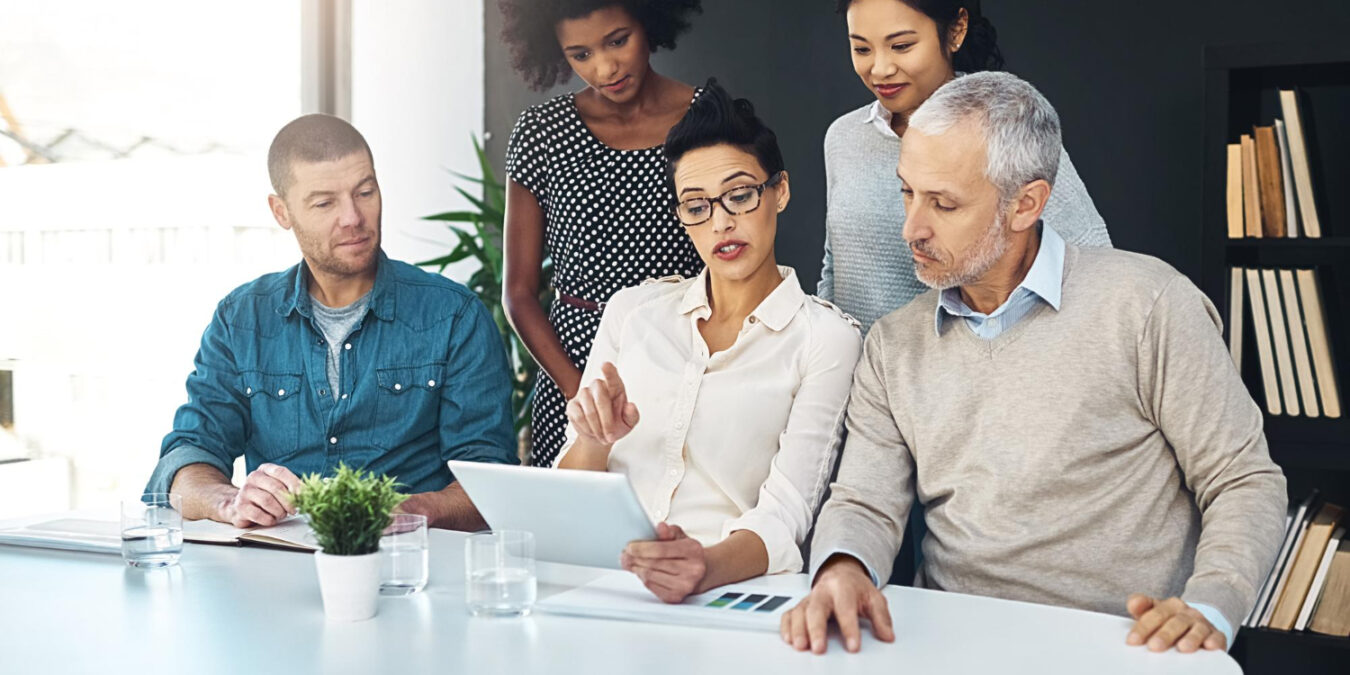 Diverse workforce discussing inclusive benefits options