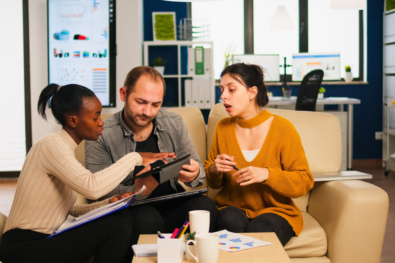 13516 Small business team discussing employee benefits strategy