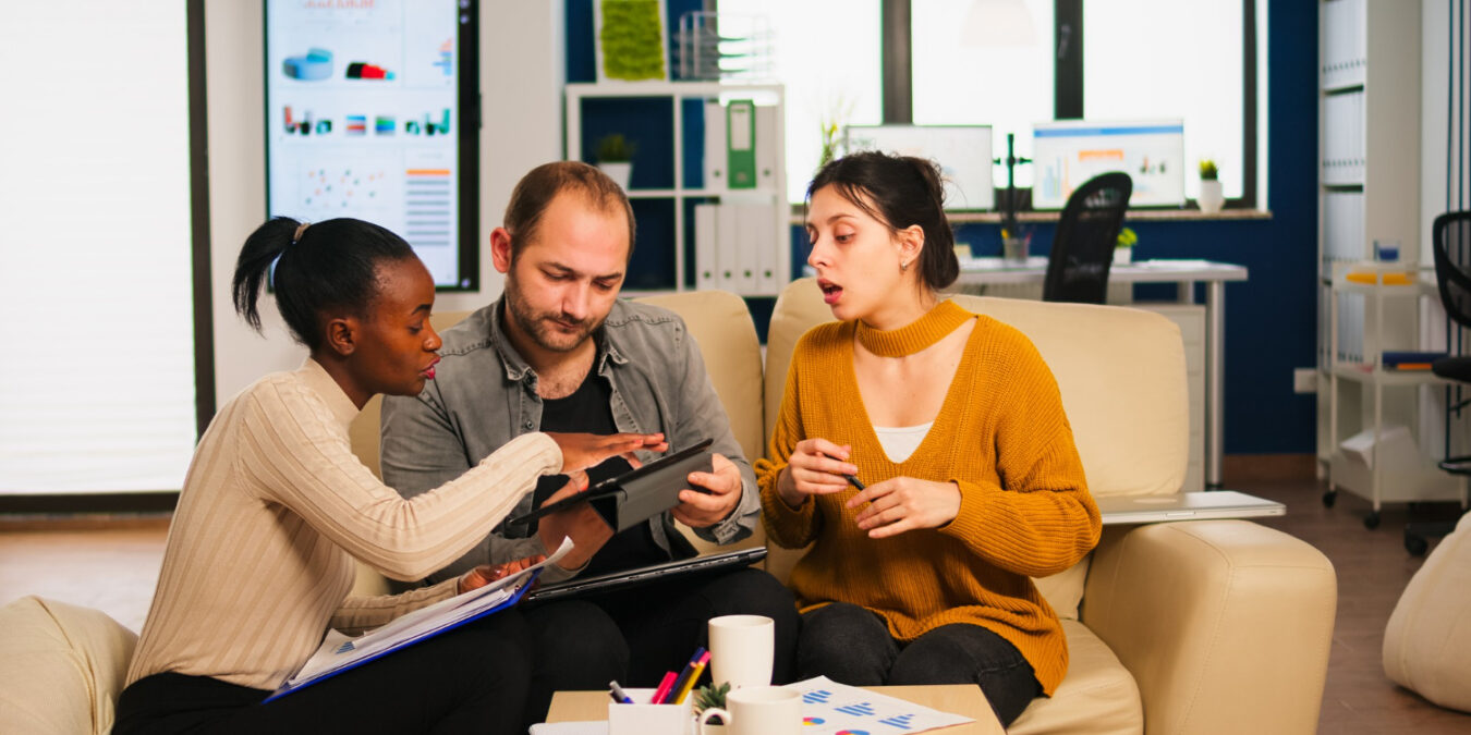 Small business team discussing employee benefits strategy