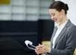 HR professional reviewing employee benefits compliance checklist for 2025