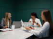 HR team providing benefits education to reduce employee stress