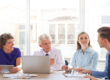 Employees learning about financial wellness benefits and retirement planning resources