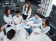 Employees participating in benefits enrollment education and plan selection
