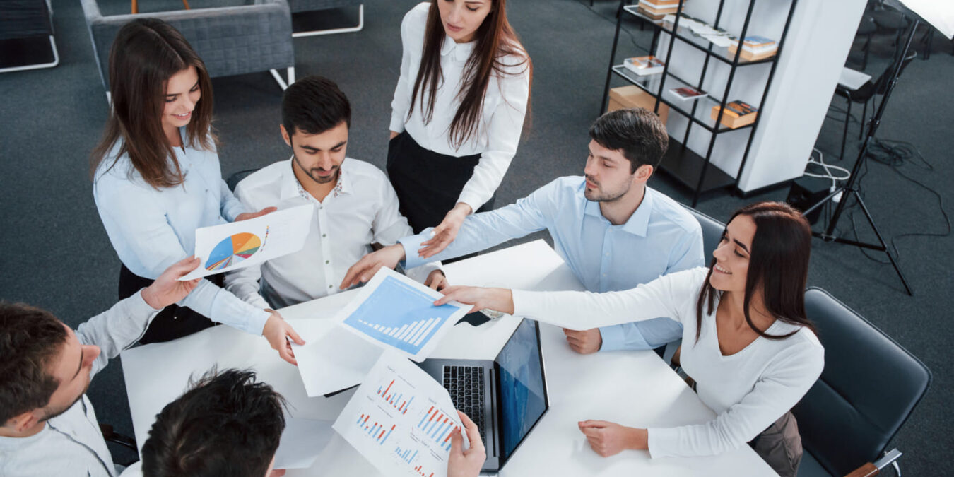 Employees participating in benefits enrollment education and plan selection
