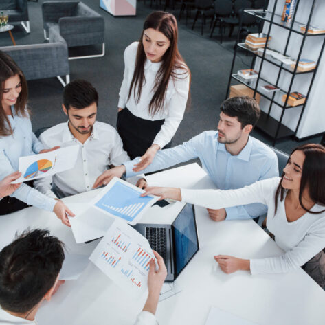 Employees participating in benefits enrollment education and plan selection