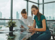 Employees reviewing why employee benefits matter in a compensation package