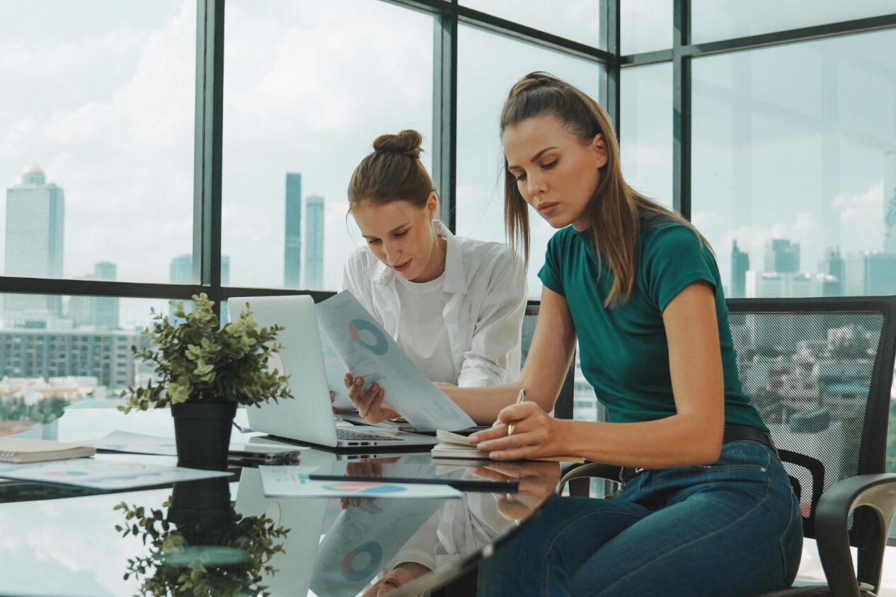 Employees reviewing why employee benefits matter in a compensation package