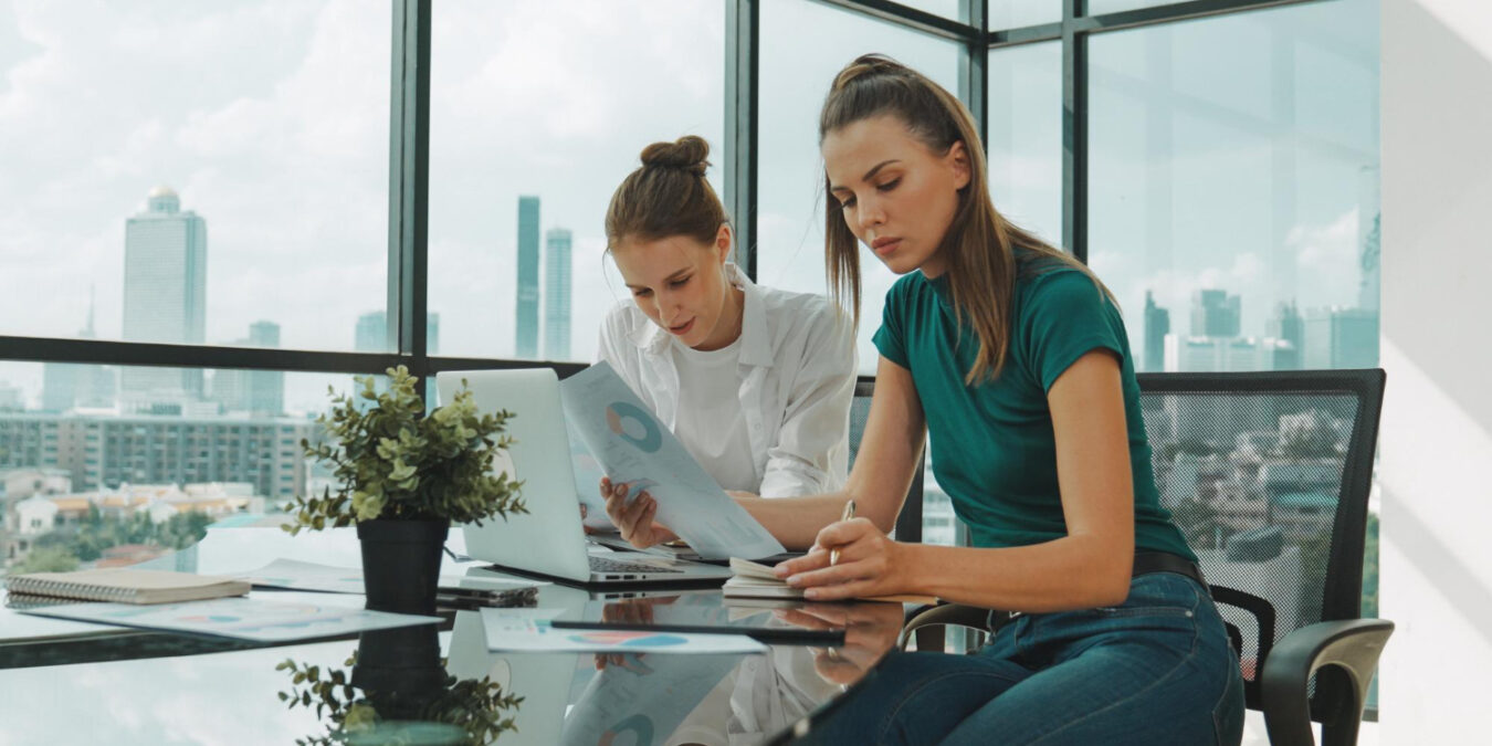 Employees reviewing why employee benefits matter in a compensation package