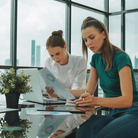 Employees reviewing why employee benefits matter in a compensation package
