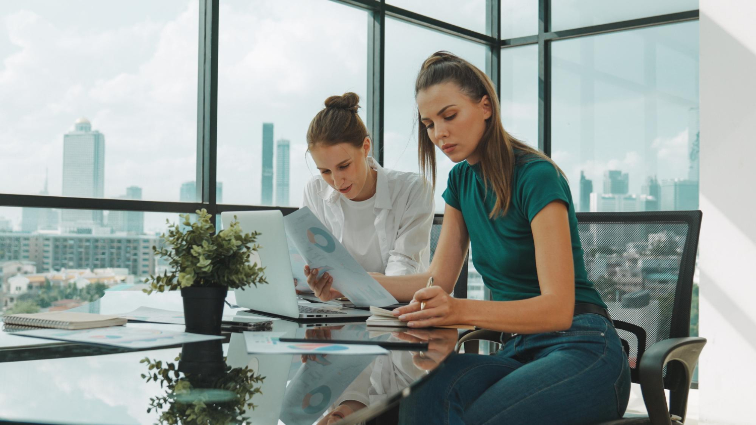 Employees reviewing why employee benefits matter in a compensation package